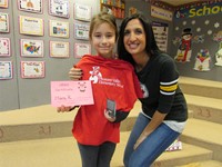 Mrs. Ali and one of our student winners