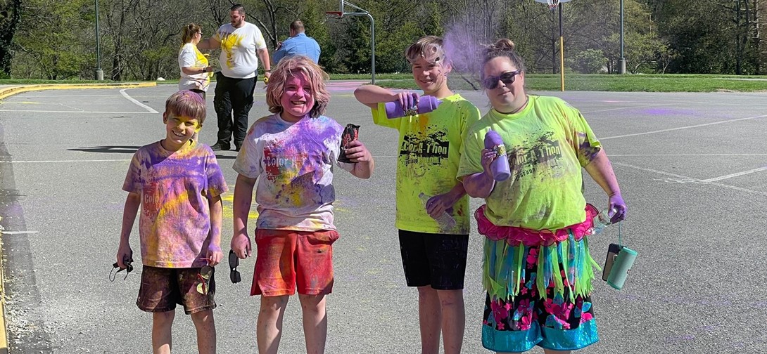 runners covered in color powder