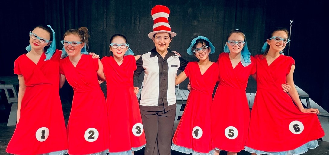 Students in costume as Dr. Seuss and Thing 1-6.