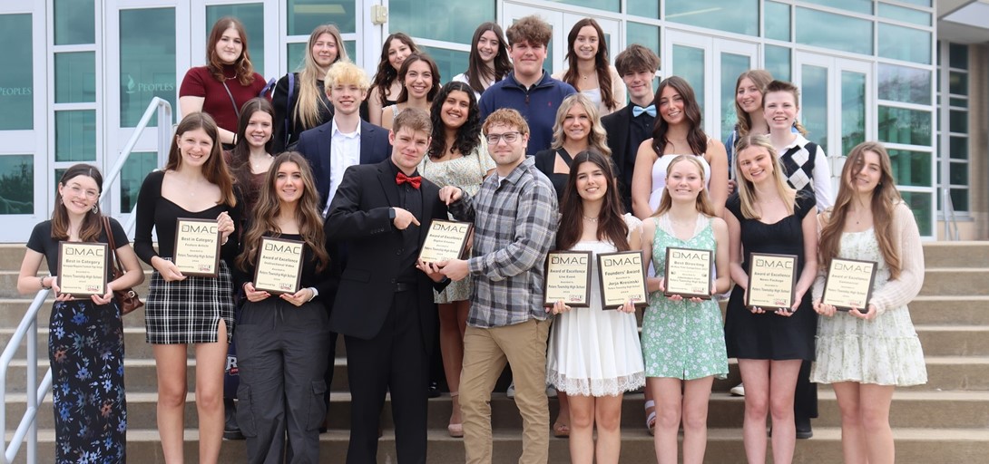 Students pose with their plaques at the festival.